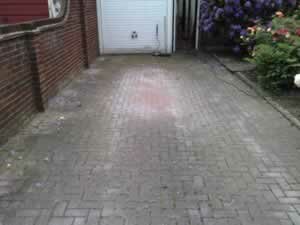 Brick paving driveway before pressure washing